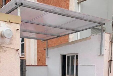 Retirada de amianto en comunidad de vecinos en patio de luces, retirada de bajantes de amianto
